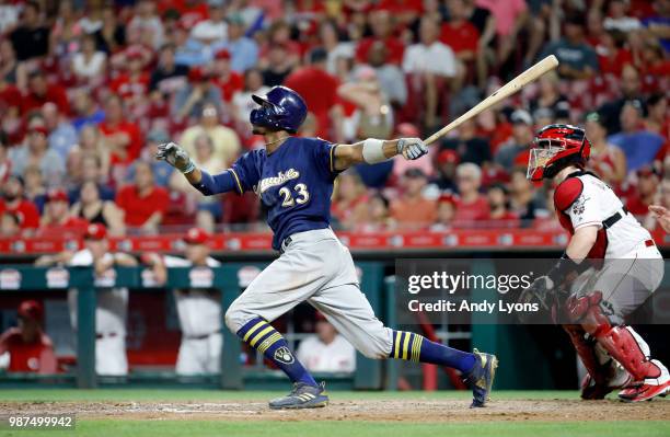 Keon Broxton of the Milwaukee Brewers hits a home run in the ninth inning against the Cincinnati Reds at Great American Ball Park on June 29, 2018 in...