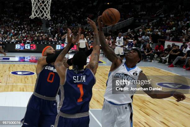 Quentin Richardson of Power grabs a rebound against Drew Gooden of 3's Company during week two of the BIG3 three on three basketball league at United...