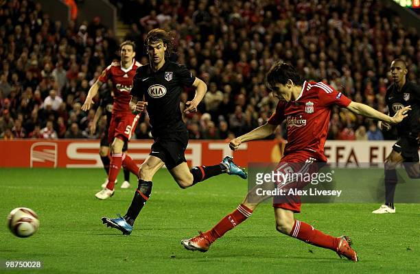 Yossi Benayoun of Liverpool scores his team's second goal during the UEFA Europa League Semi-Final Second Leg match between Liverpool and Atletico...