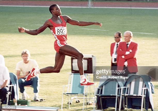 Carl Lewis competes in the long jump, circa 1980s.