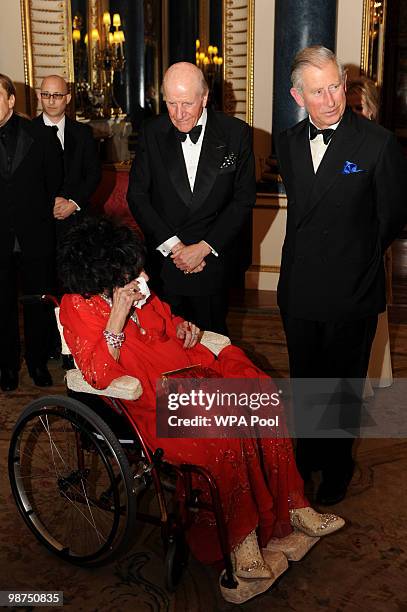 Prince Charles, Prince of Wales actress Dame Elizabeth Taylor and President of the Royal Welsh College, Lord Rowe-Beddoe attend a Royal Welsh College...