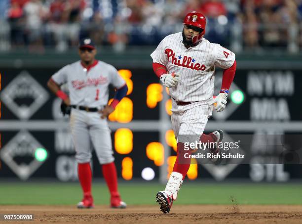 Carlos Santana of the Philadelphia Phillies circles the bases after hitting a two-run home run against the Washington Nationals during the seventh...