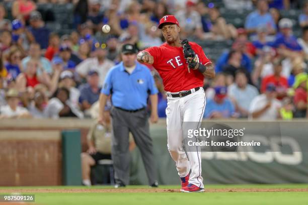 Texas Rangers Designated hitter Adrian Beltre throws to first after making a play on a ground ball during the game between the Chicago White Sox and...