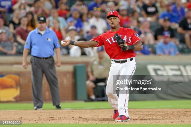 Texas Rangers Third base Adrian Beltre throws to first after fielding a ground ball during the game between the Chicago White Sox and Texas Rangers...