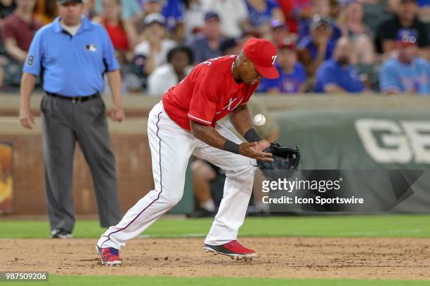 Texas Rangers Third base Adrian Beltre bobbles a ground ball during the game between the Chicago White Sox and Texas Rangers on June 29, 2018 at...