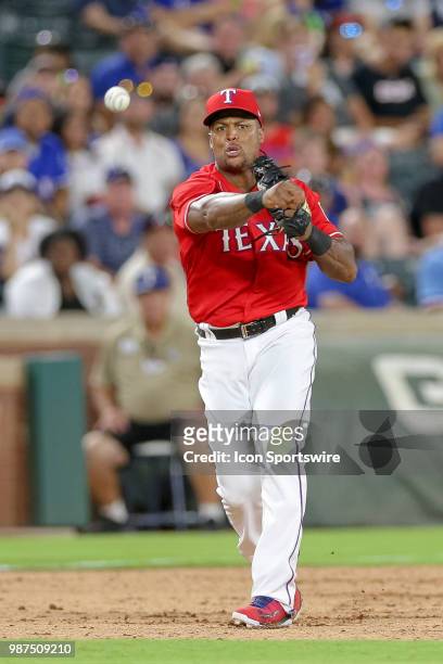 Texas Rangers Third base Adrian Beltre throws to first after fielding a ground ball during the game between the Chicago White Sox and Texas Rangers...