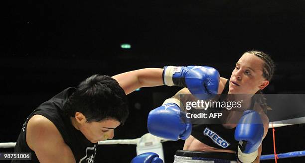 Israeli boxer Hagar Shmoulefeld Finer vies with Agnese Boza from Latvia during the Women's International Boxing Federation Bantam category...