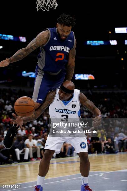 Andre Emmett of 3's Company and Quentin Richardson of Power battle for the ball during week two of the BIG3 three on three basketball league at...