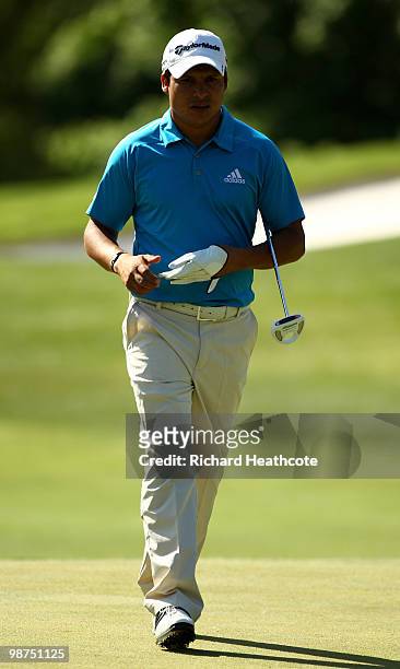 Andres Romero of Argentina walks across the 5th green during the first round of the Quail Hollow Championship at Quail Hollow Country Club on April...