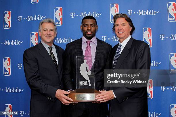 Tyreke Evans of the Sacramento Kings poses with President of Basketball Operations Geoff Petrie and Head Coach Paul Westphal following the NBA...
