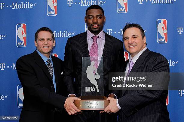 Tyreke Evans of the Sacramento Kings poses with co-owners Joe and Gavin Maloof and the Rookie of the Year award on April 29, 2010 at ARCO Arena in...