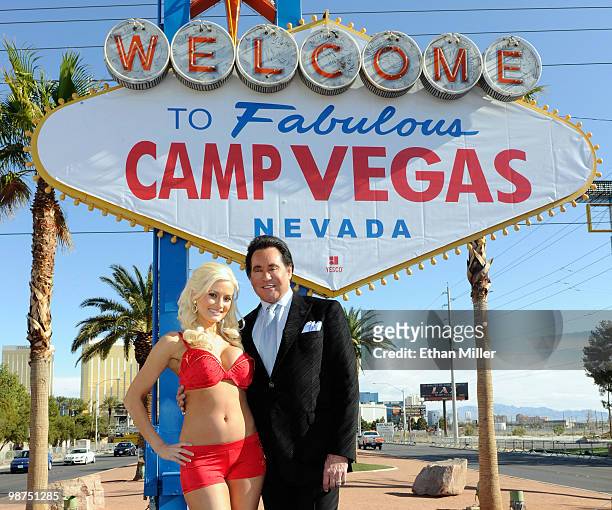 Model and television personality Holly Madison and entertainer Wayne Newton appear at the "Welcome to Fabulous Las Vegas" sign during the launch...
