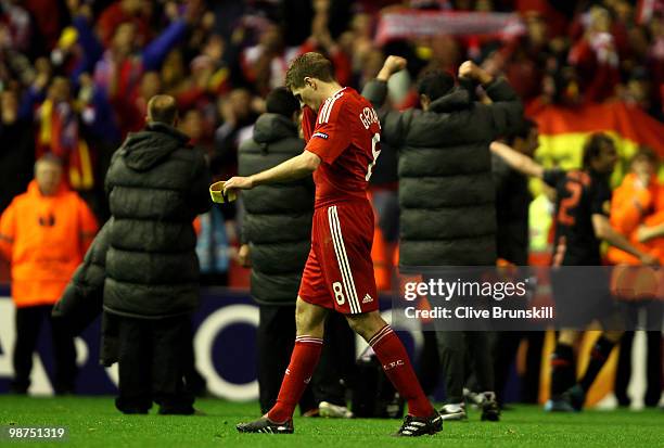 Steven Gerrard of Liverpool heads for the dressing room dejectedly at the end of the UEFA Europa League Semi-Final Second Leg match between Liverpool...
