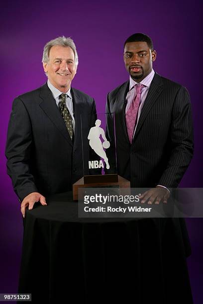 Tyreke Evans of the Sacramento Kings poses with Head Coach Paul Westphal and the NBA T-Mobile Rookie of the Year award on April 29, 2010 at ARCO...