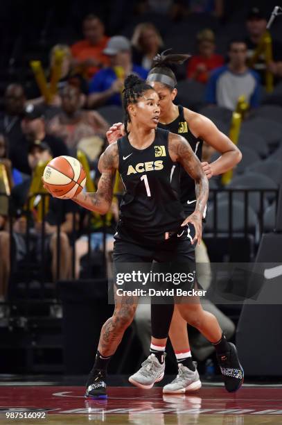 Tamera Young of the Las Vegas Aces handles the ball against the Los Angeles Sparks on June 29, 2018 at the Mandalay Bay Events Center in Las Vegas,...