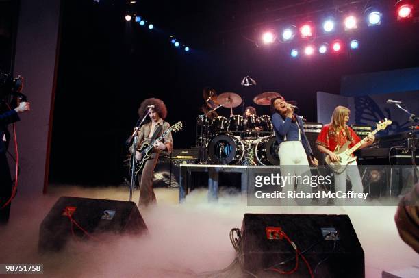 Neal Schon, Aynsley Dunbar, Steve Perry and Ross Valory of Journey perform live in 1978 in San Francisco, California.