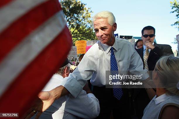 Florida Gov. Charlie Crist greets supporters at his announcement that he will make an independent bid for the open U.S. Senate seat on April 29, 2010...