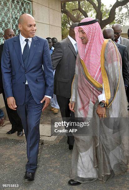 Senegalese minister of state Karim Wade walks with Cheikh Saad Mohamed ben Laden , vice-president of Pcmc, a subsidiary of Saudi Binladin group...