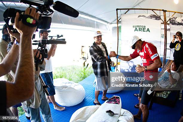 Jadson Andre of Brazil is congratulated by Adriano De Souza of Brazil after winning the 2010 Santa Catarina Pro on April 29, 2010 in Santa Catarina,...