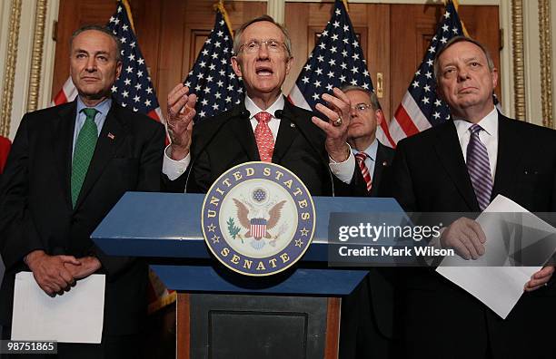 Senate Majority Leader Harry Reid , speaks while flanked by Sen. Richard Durbin , Sen. Robert Menendez , and Sen.Chuck Schumer during a news...