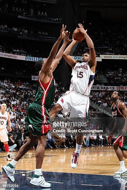 Al Horford of the Atlanta Hawks shoots a jump shot against Kurt Thomas of the Milwaukee Bucks in Game Five of the Eastern Conference Quarterfinals...
