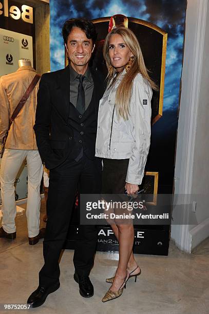 Giulio Base and Tiziana Rocca attend a cocktail party for the premiere of 'Iron Man 2' at the Belstaff flagship store on April 29, 2010 in Rome,...