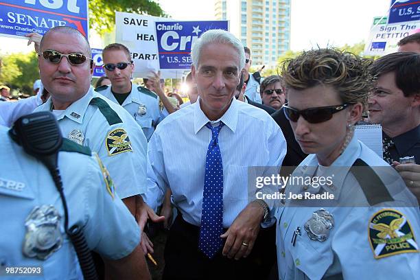 Florida Gov. Charlie Crist walks to his vehicle after announcing that he will make an independent bid for the open U.S. Senate seat on April 29, 2010...