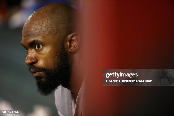 Austin Jackson of the San Francisco Giants watches from the dugout during the seventh inning of the MLB game against the Arizona Diamondbacks at...