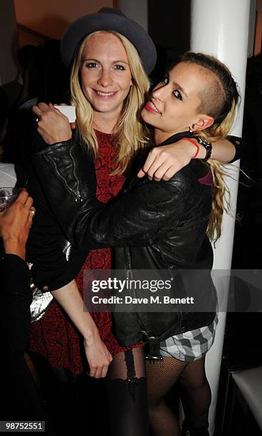 Poppy Delevingne and Alice Dellal attend the Sunglass Hut flagship store opening party at Sunglass Hut on April 29, 2010 in London, England.