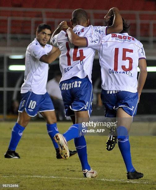 Uruguayan Nacional's Mario Regueiro celebrates with teammate Alvaro Gonzalez after his goal against Brazilian Cruzeiro during their Copa Libertadores...