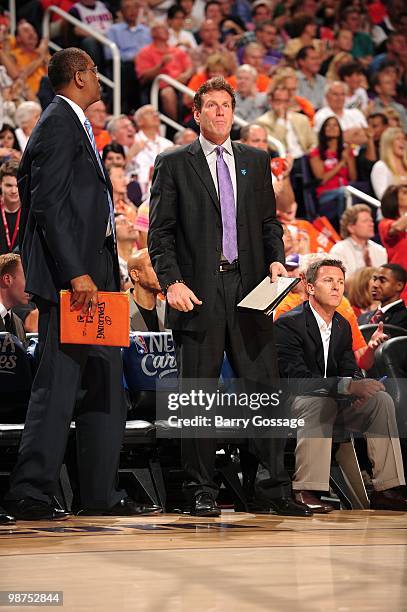Assistant coaches Bill Cartwright and Dan Majerle of the Phoenix Suns stand courtside as the Suns take on the Portland Trail Blazers in Game Five of...