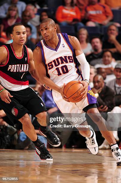 Leandro Barbosa of the Phoenix Suns drives around Jerryd Bayless of the Portland Trail Blazers in Game Five of the Western Conference Quarterfinals...