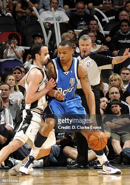 Caron Butler of the Dallas Mavericks posts up against Manu Ginobili of the San Antonio Spurs in Game Four of the Western Conference Quarterfinals...