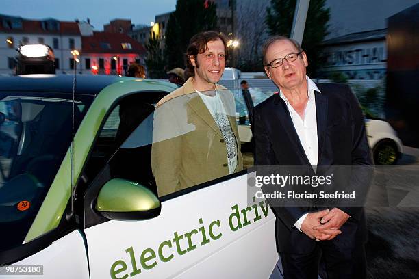 Actor Burghart Klaussner and actor Oliver Korittke attend the 'smart fortwo electric drive' presentation at the 'smart urban stage 2010' opening on...