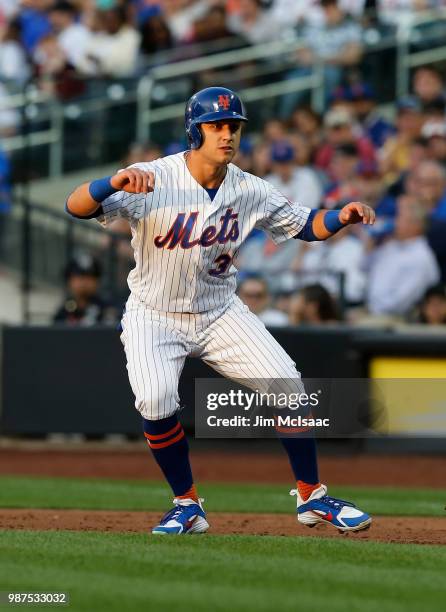 Michael Conforto of the New York Mets in action against the Pittsburgh Pirates at Citi Field on June 26, 2018 in the Flushing neighborhood of the...