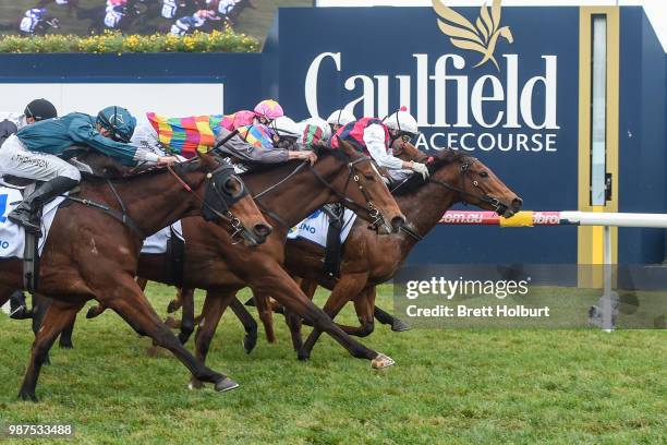 Zarpoya ridden by Dwayne Dunn wins the Keno Kwikpik Handicap at Caulfield Racecourse on June 30, 2018 in Caulfield, Australia.