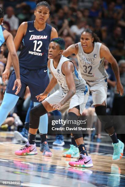 Danielle Robinson of the Minnesota Lynx guards the ball against the Atlanta Dream on June 29, 2018 at Target Center in Minneapolis, Minnesota. NOTE...