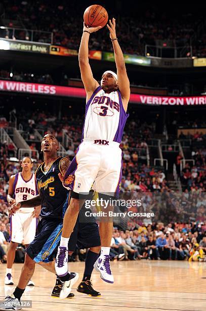 Jared Dudley of the Phoenix Suns shoots during the game against the Denver Nuggets at U.S. Airways Center on April 13, 2010 in Phoenix, Arizona. The...