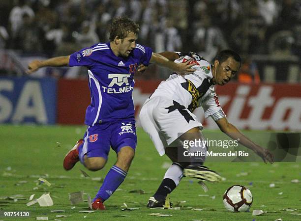 Henry Quinteros of Alianza Lima fights for the ball with Felipe Seymour of Universidad de Chile during a match as part of the Libertadores Cup at...