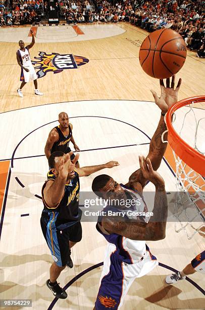 Earl Clark of the Phoenix Suns goes for a layup during the game against the Denver Nuggets at U.S. Airways Center on April 13, 2010 in Phoenix,...