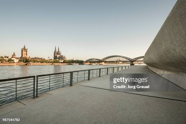 cologne at sunrise - rhein stock-fotos und bilder