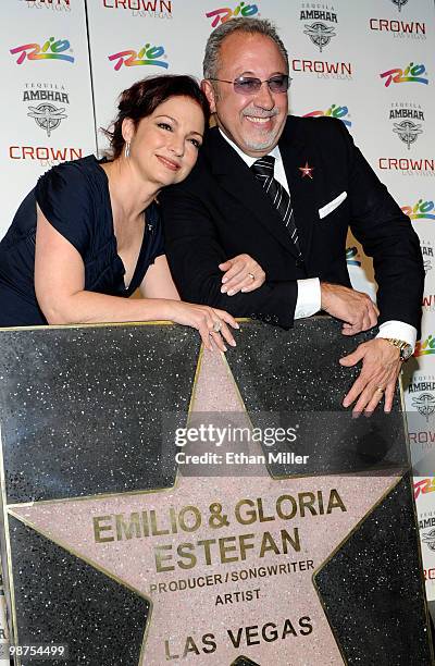 Singer Gloria Estefan and Emilio Estefan Jr. Appear with their star during a Las Vegas Walk of Stars dedication ceremony at the Crown Nightclub at...