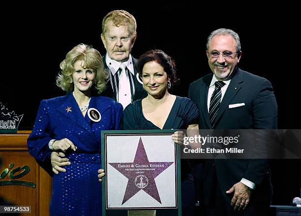 Las Vegas Walk of Stars Director Carolie Swindle, her husband, CEO Edward Swindle, singer Gloria Estefan and her husband, producer and musician...