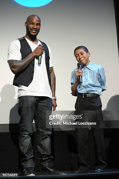 Model Tyson Beckford speaks with a Film in motion student during the Tribeca Teaches Premiere during the 2010 Tribeca Film Festival at the Tribeca...