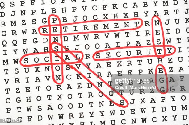 retirement word search puzzle - almanac publication stock pictures, royalty-free photos & images