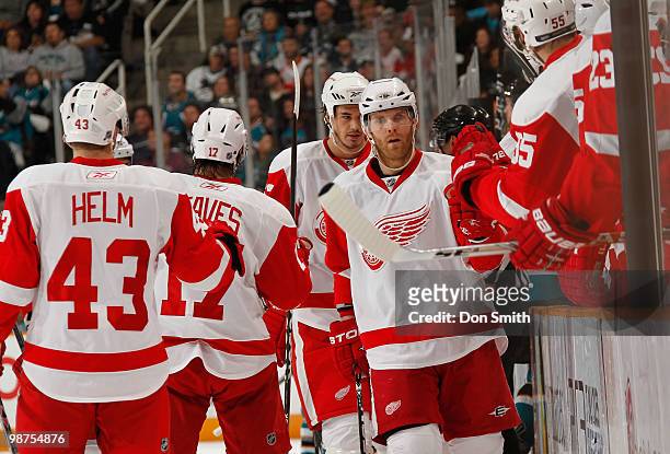 Dan Cleary, Jonathan Ericsson, Darren Helm and Patrick Eaves of the Detroit Red Wings celebrate a goal against the San Jose Sharks in Game One of the...