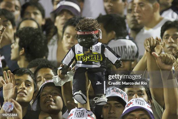 Supporters of Alianza Lima cheer their team during a match against Universidad de Chile as part of the Libertadores Cup at Alejandro Villanueva...