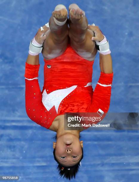 Heem Wei Lim of Singapore competes in the uneven bars during day two of the 2010 Pacific Rim Championships at Hisense Arena on April 30, 2010 in...