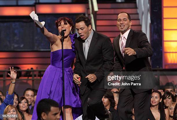 Singer Diana Reyes and Grupomania speak onstage at the 2010 Billboard Latin Music Awards at Coliseo de Puerto Rico José Miguel Agrelot on April 29,...