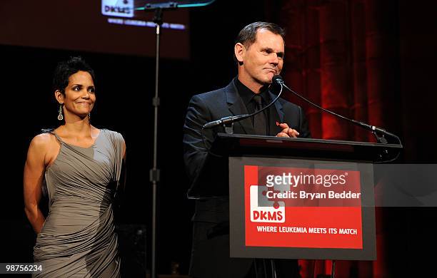 Actress Halle Berry and CEO of Coty Inc. Bernd Beetz onstage at the DKMS' 4th Annual Gala: Linked Against Leukemia at Cipriani 42nd Street on April...